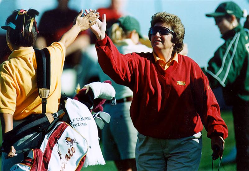 Linda Golfing.